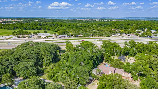 a view of a city with a yard