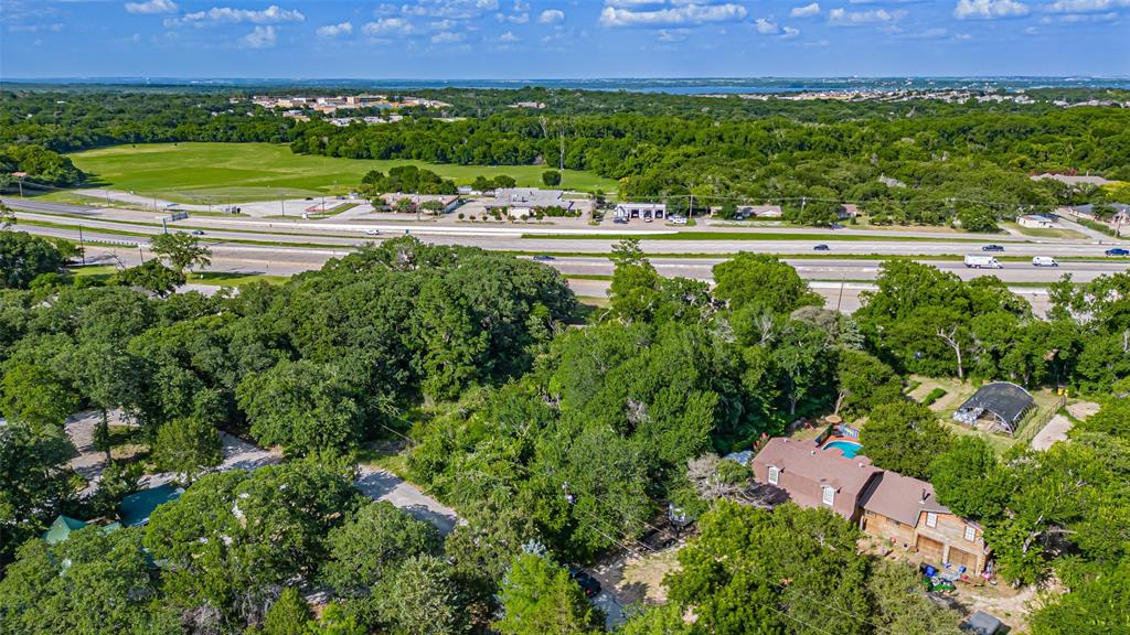 717 Mary Lou Azle, TX 76020 - Photo 8 of 28 an aerial view of a house with a yard and lake view