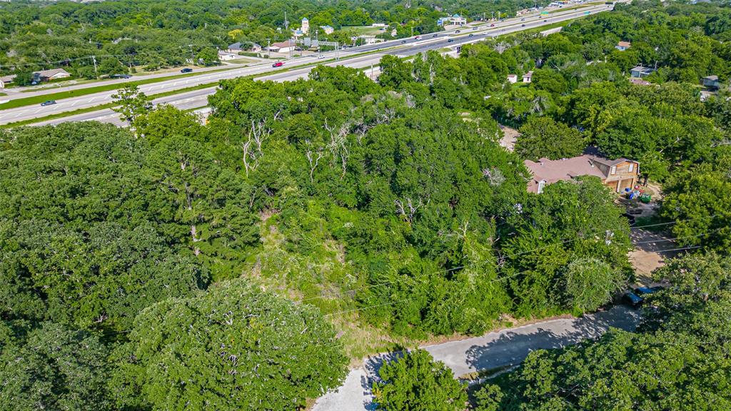 717 Mary Lou Azle, TX 76020 - Photo 10 of 28 a view of a city with lush green forest