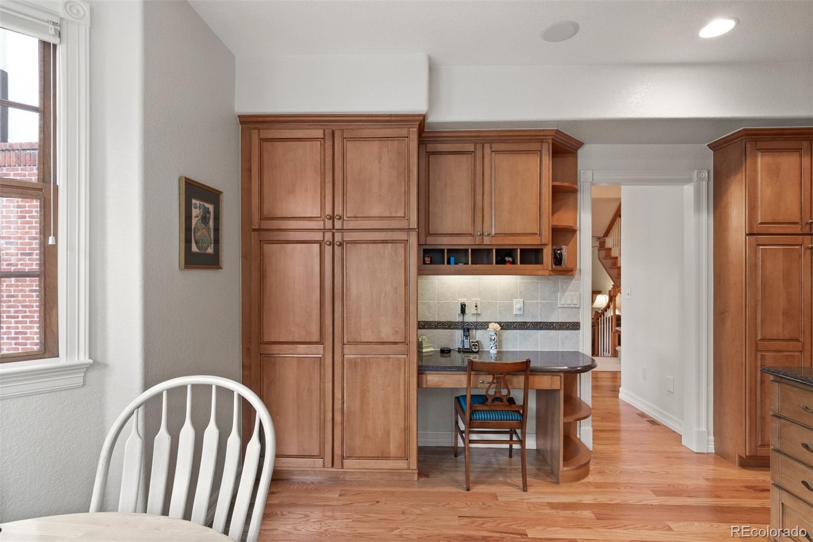 64 South Garfield Street Denver, CO 80209 - Photo 17 of 39 a view of kitchen with furniture wooden floor and window