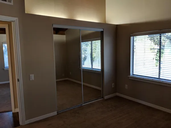 an empty room with windows