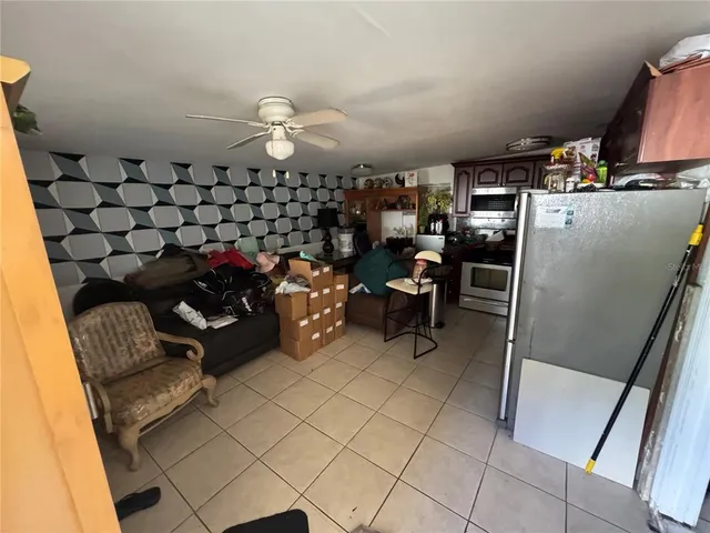 a view of a backyard of the house