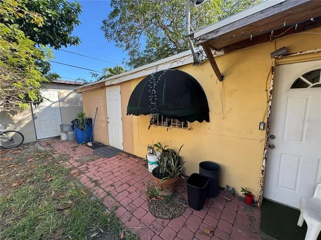 a room with furniture and a flat screen tv