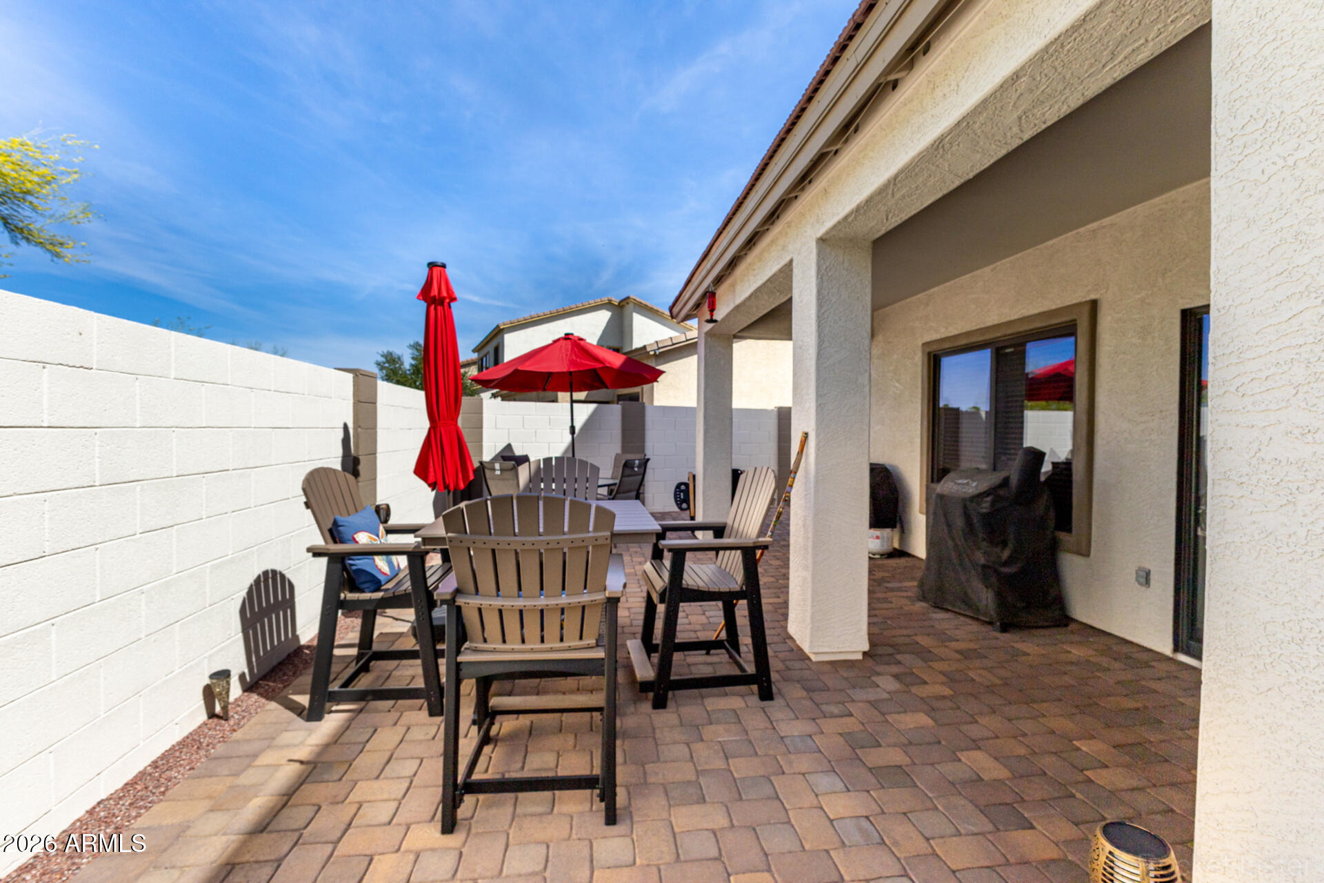2756 South Powell Road Apache Junction, AZ 85119 - Photo 30 of 37 a view of a patio with table and chairs and potted plants