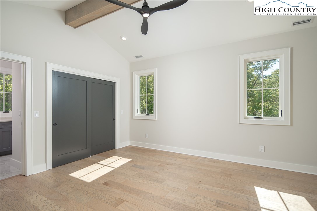 353 Calico Court Boone, NC 28607 - Photo 28 of 50 a view of a room with a window and ceiling fan