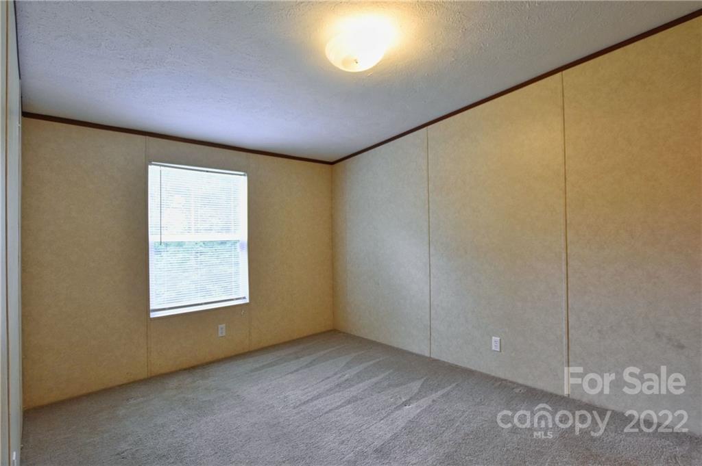 191 East Bells Branch Road Blacksburg, SC 29702 - Photo 11 of 14 a view of an empty room with a window