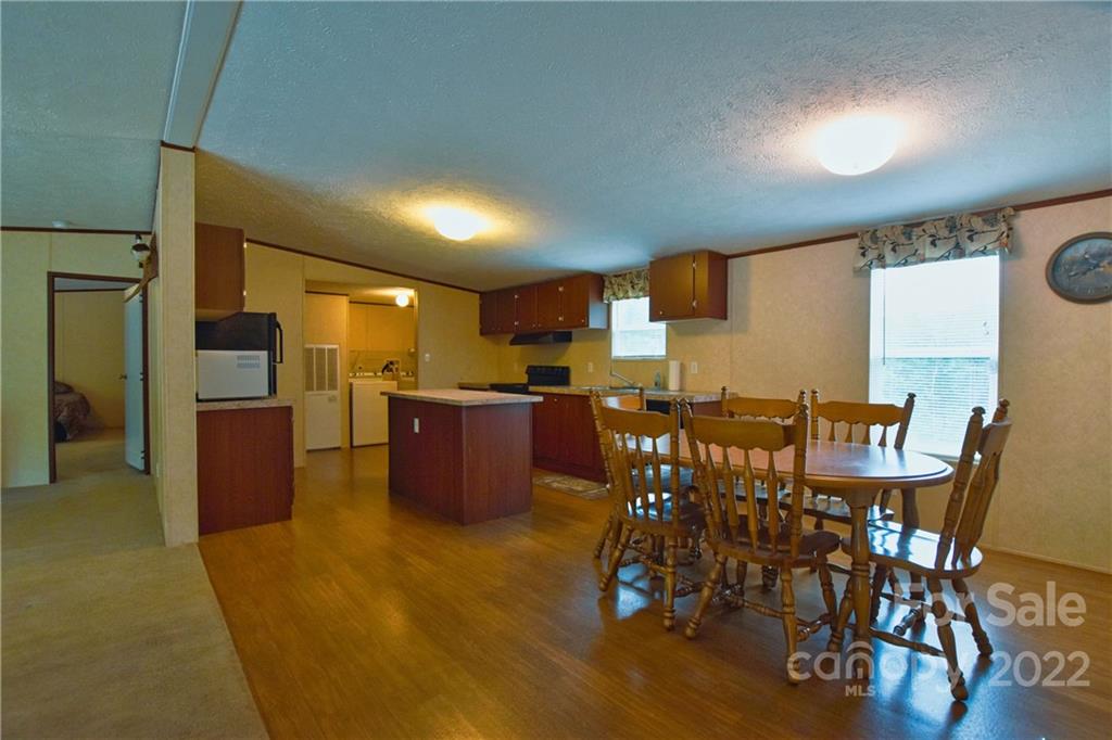 191 East Bells Branch Road Blacksburg, SC 29702 - Photo 5 of 14 a view of a dining room with furniture