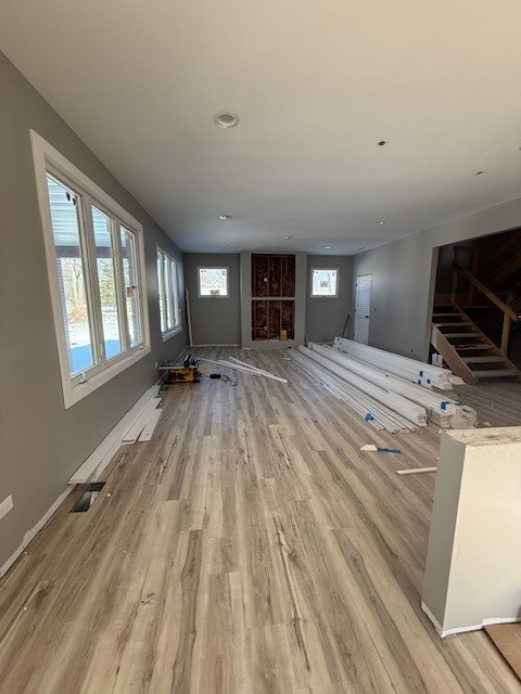 7128 Cork Avenue Justice, IL 60458 - Photo 3 of 17 a view of an empty room with a window and a kitchen