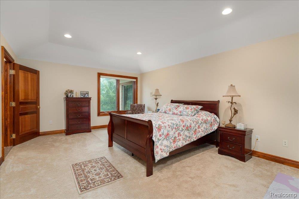 3543 Cedar Brook Drive Rochester, MI 48309 - Photo 82 of 99 Recessed lighting, wood-trim window, wood-paneled door, and carpeted flooring