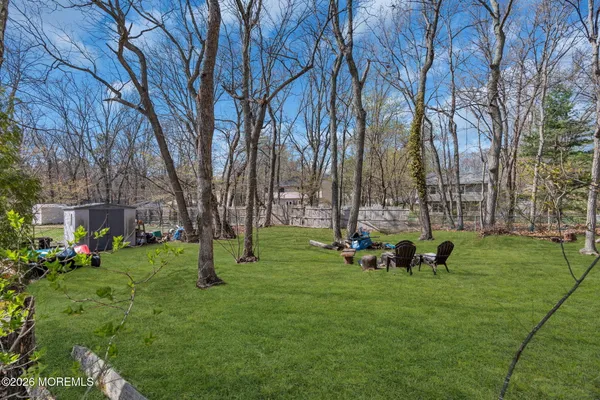 a view of yard with trees