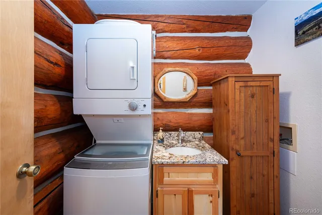 a bathroom with a toilet and a sink
