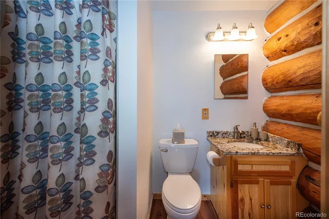 a bedroom with two beds and painted walls