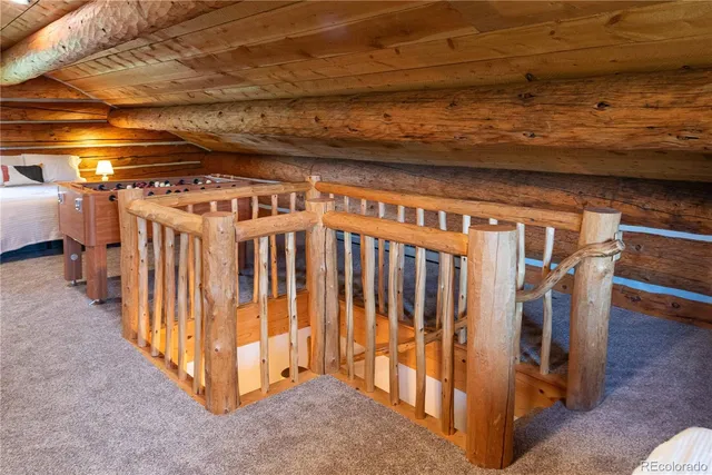 a view of a terrace with wooden floor and outdoor seating