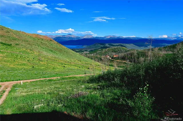a view of room with wooden floor