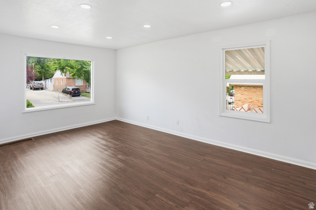 774 37th Street South Ogden, UT 84403 - Photo 11 of 47 Spacious interior room featuring wood-finish flooring, crisp white walls, and recessed lighting