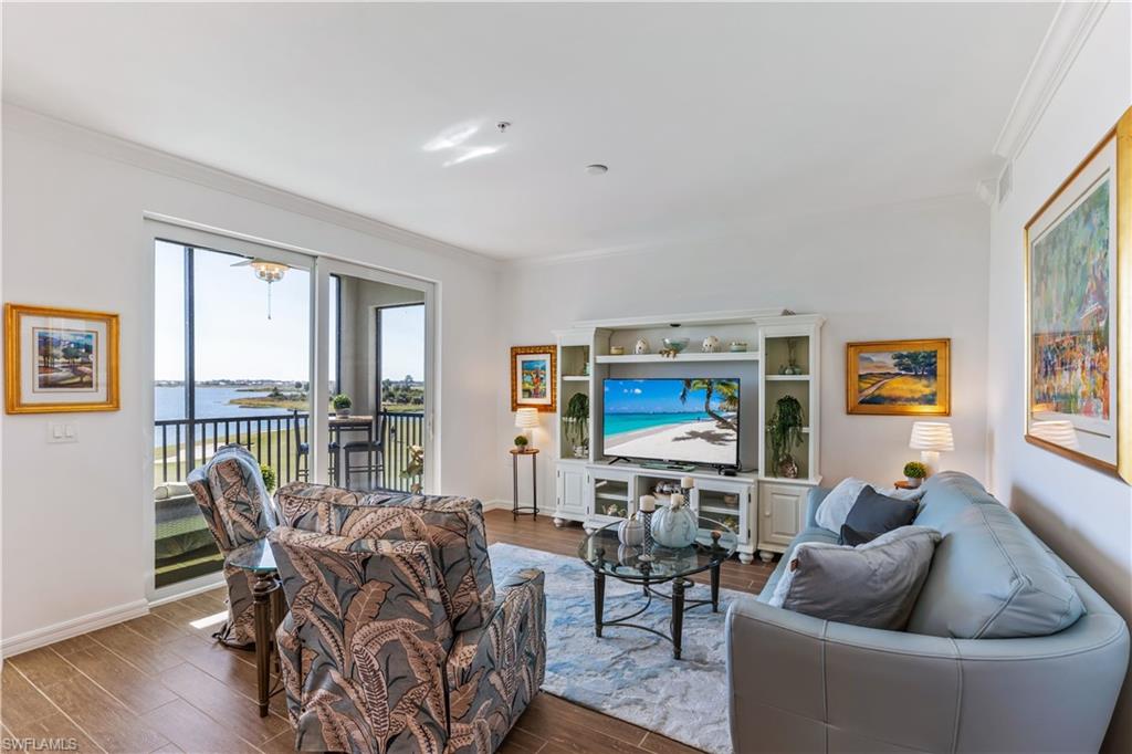 43010 Greenway Boulevard, Unit 237 Punta Gorda, FL 33982 - Photo 2 of 11 a living room with furniture and a window
