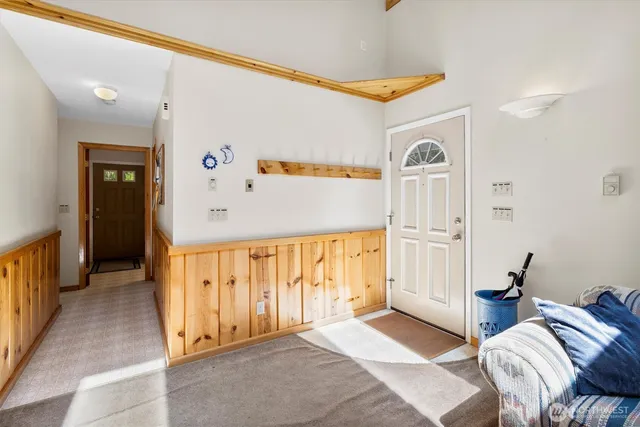 a view of a bedroom with furniture and staircase