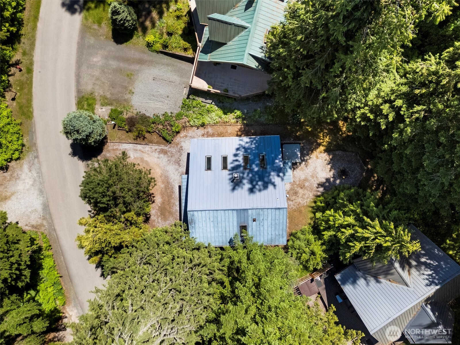 7101 Rainier Way Glacier, WA 98244 - Photo 29 of 38 an aerial view of a house with a yard and garden