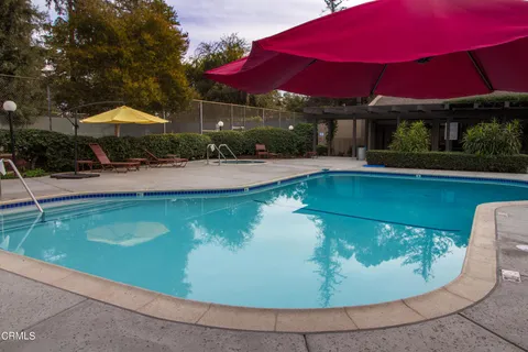 a view of a house with swimming pool