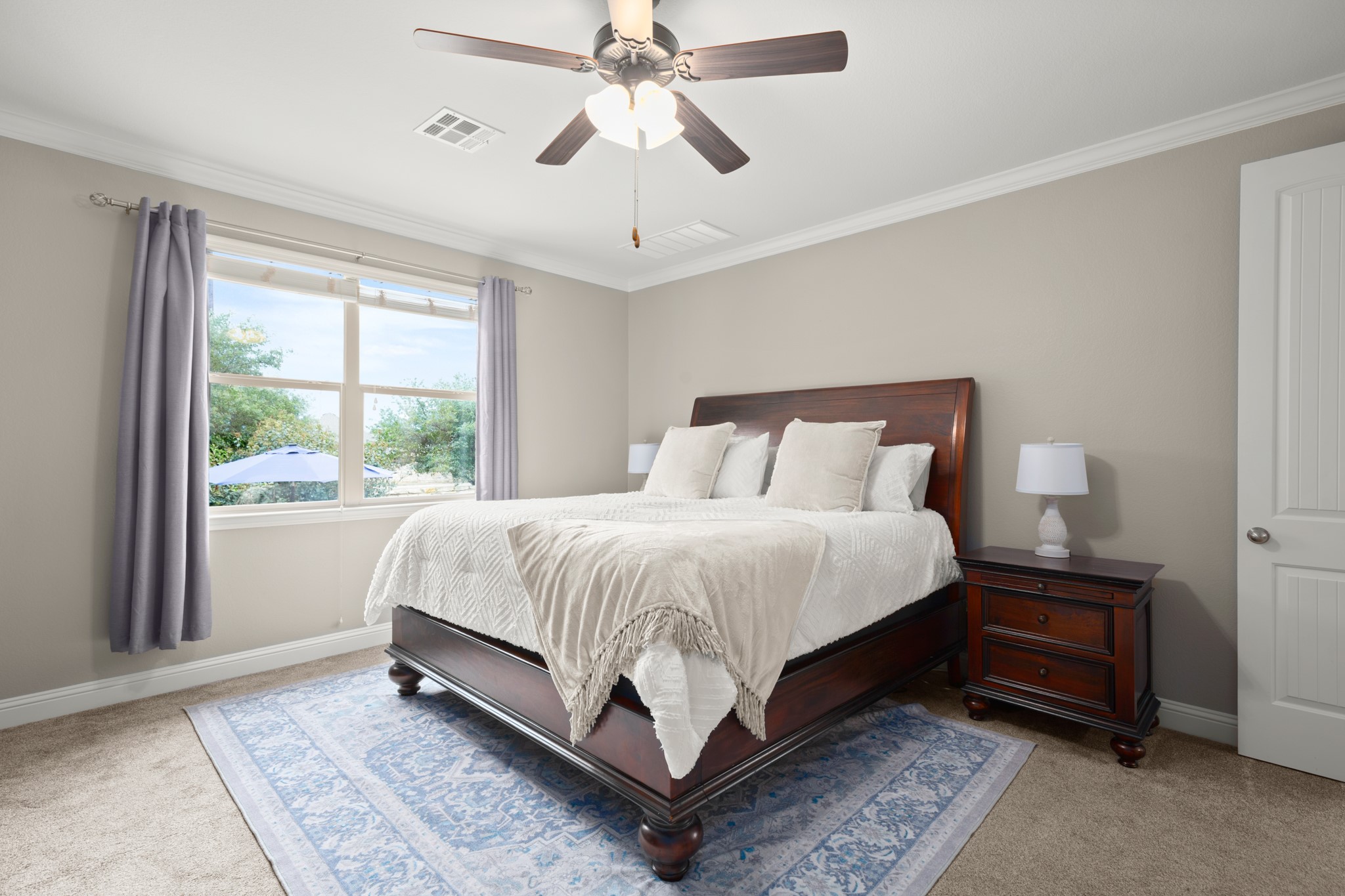 502 Spring Arbor Lane Cedar Park, TX 78613 - Photo 19 of 40 The primary suite is secluded away in the back corner of the home overlooking the backyard.