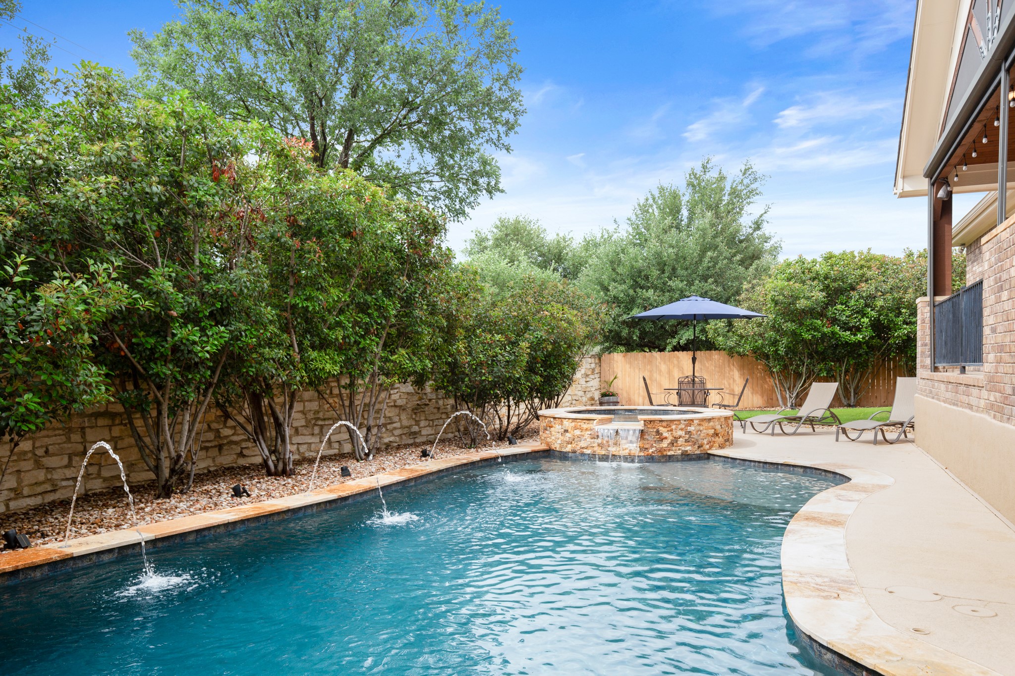502 Spring Arbor Lane Cedar Park, TX 78613 - Photo 2 of 40 Elevate your outdoor lifestyle with your own private resort-style pool and spa!