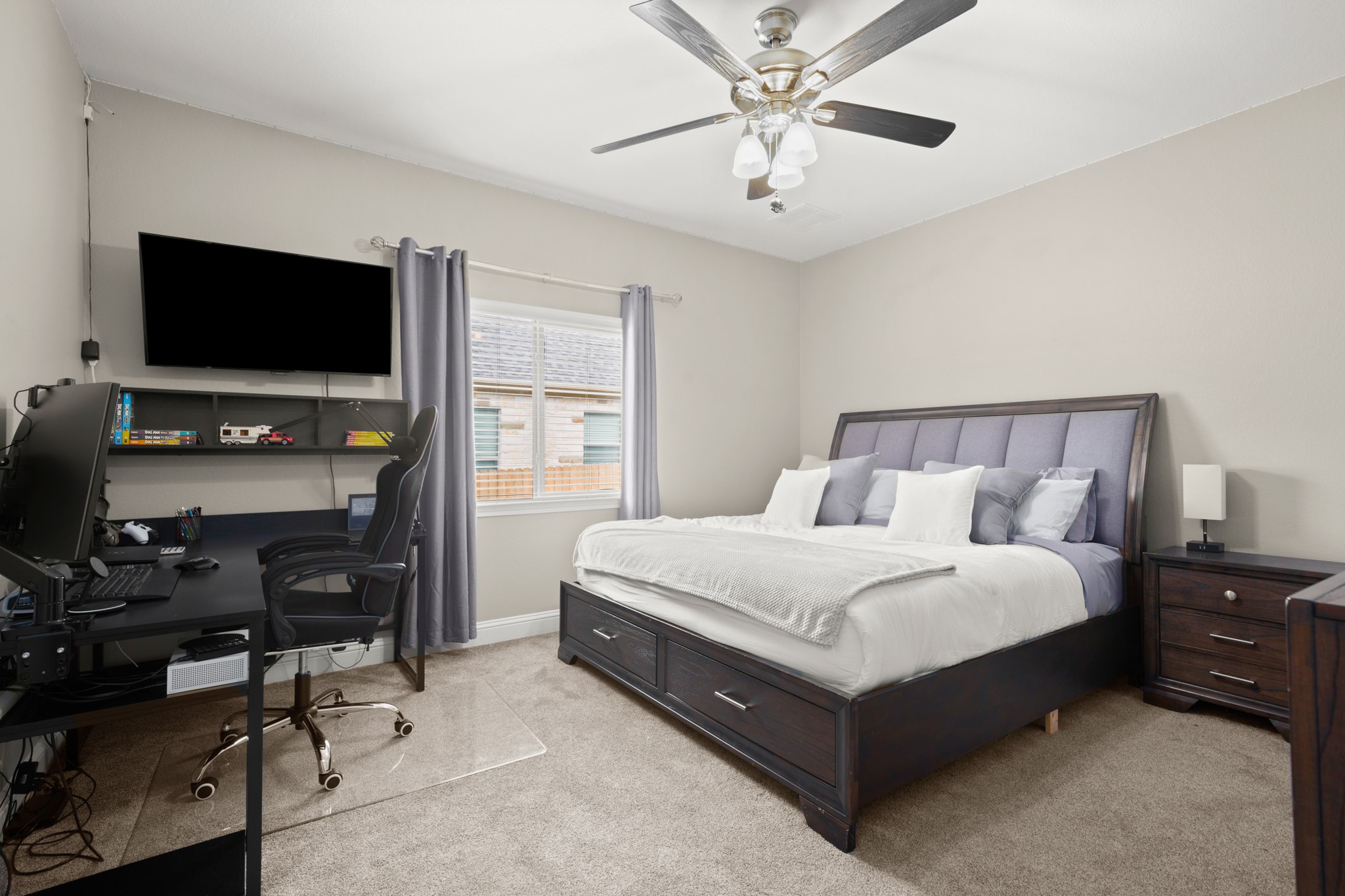 502 Spring Arbor Lane Cedar Park, TX 78613 - Photo 23 of 40 This secondary bedroom is secluded away at the other end of the primary suite hallway.