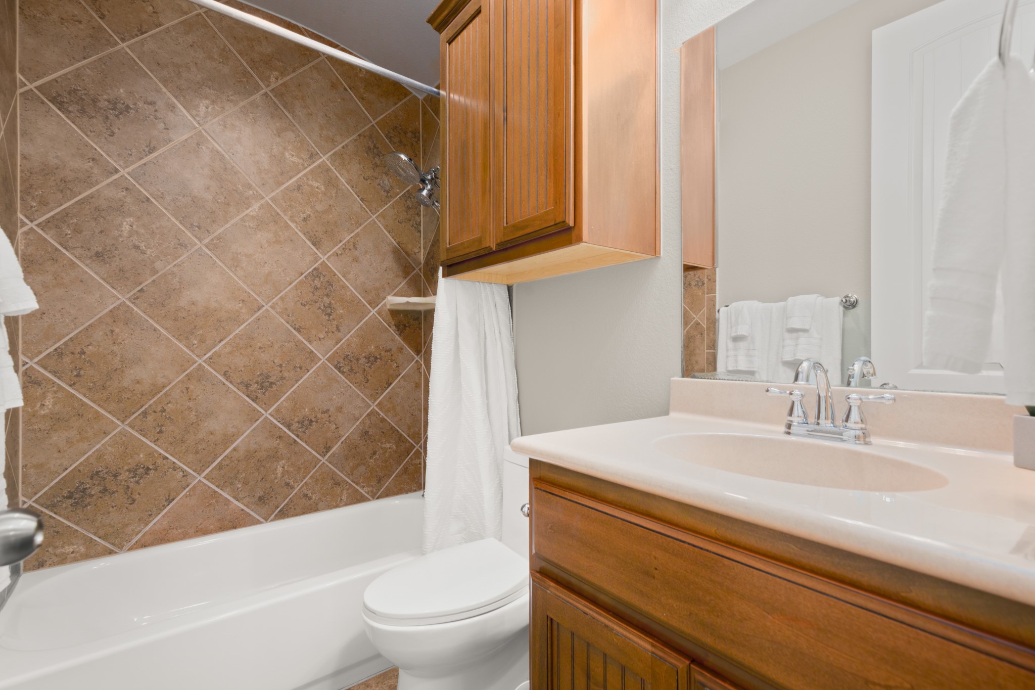 502 Spring Arbor Lane Cedar Park, TX 78613 - Photo 24 of 40 This full secondary bathroom sits next to the secluded secondary bedroom and offers a shower/tub combo with tasteful tile backsplash.