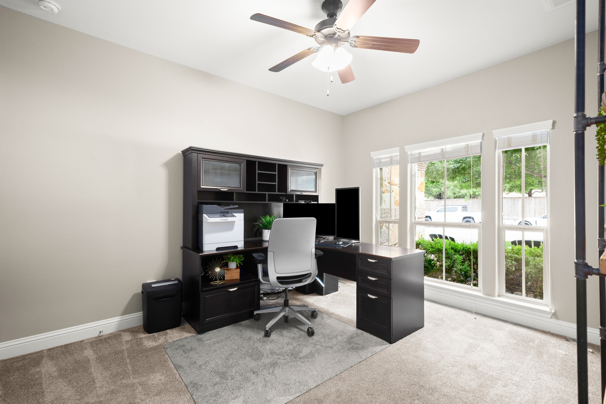 502 Spring Arbor Lane Cedar Park, TX 78613 - Photo 25 of 40 French doors off the foyer open into a home office with a picture window overlooking the front yard.