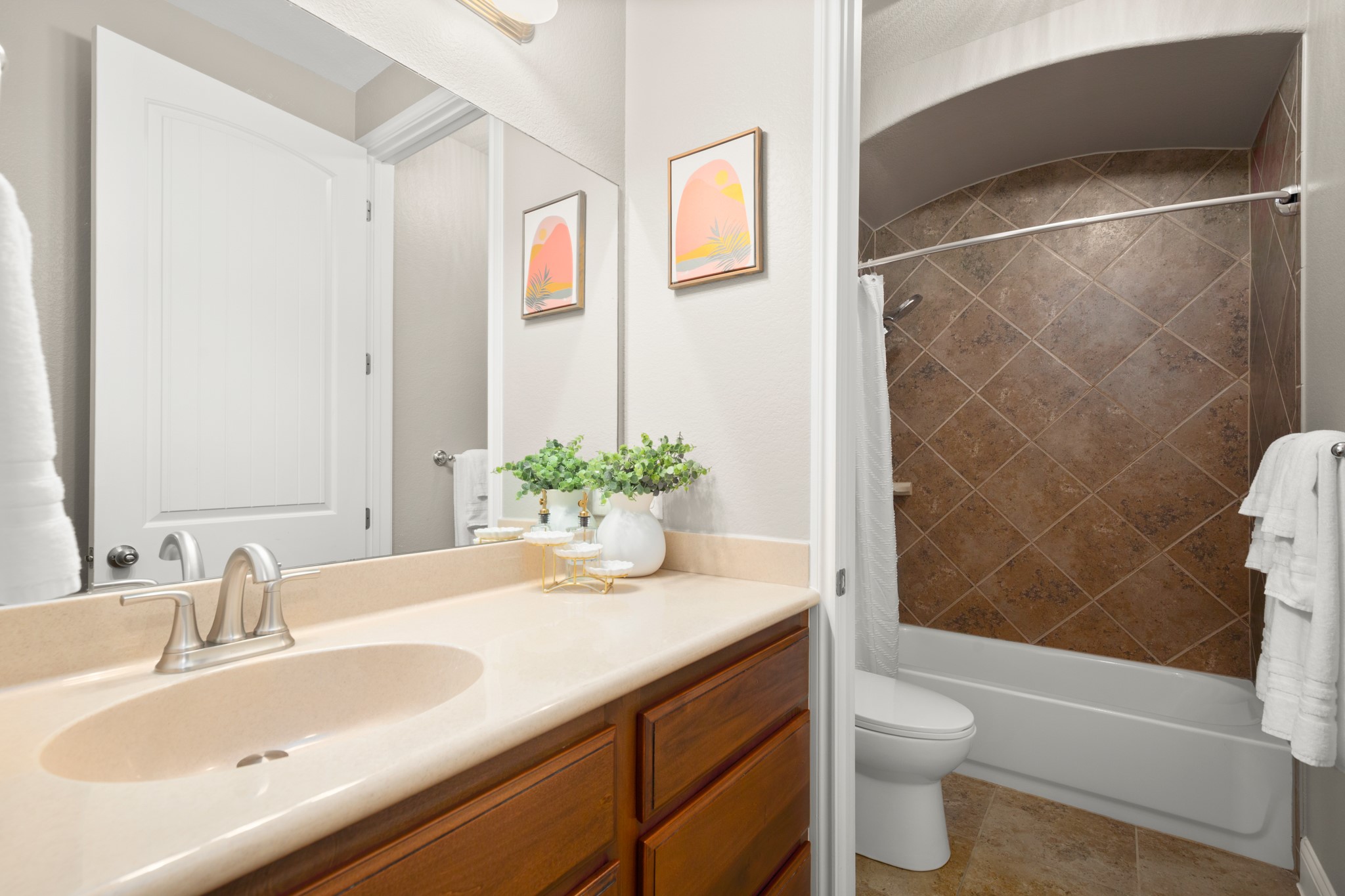 502 Spring Arbor Lane Cedar Park, TX 78613 - Photo 29 of 40 This full secondary bathroom comes with a spacious vanity and a conveniently private wet room with the shower/tub combo.