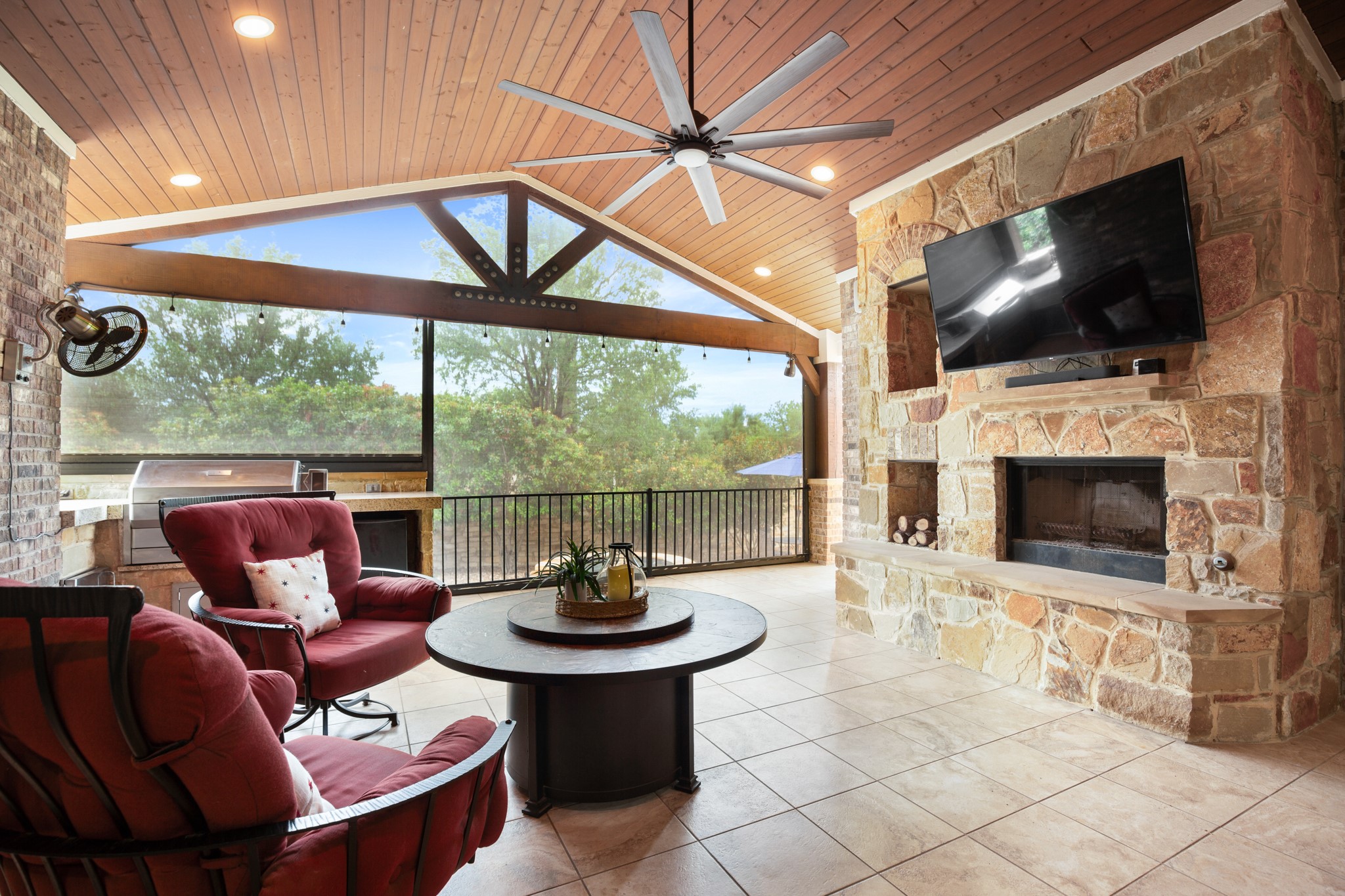 502 Spring Arbor Lane Cedar Park, TX 78613 - Photo 3 of 40 Outdoor living at its finest with this stunning entertainer's covered porch, complete with electronic screens.