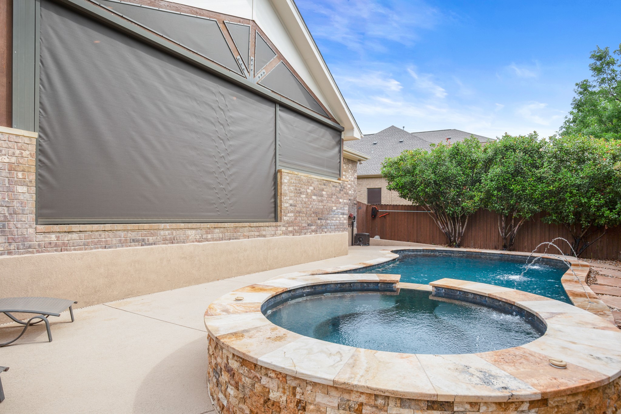 502 Spring Arbor Lane Cedar Park, TX 78613 - Photo 35 of 40 Electronic screens on the back porch allow you to block out the suns glare.