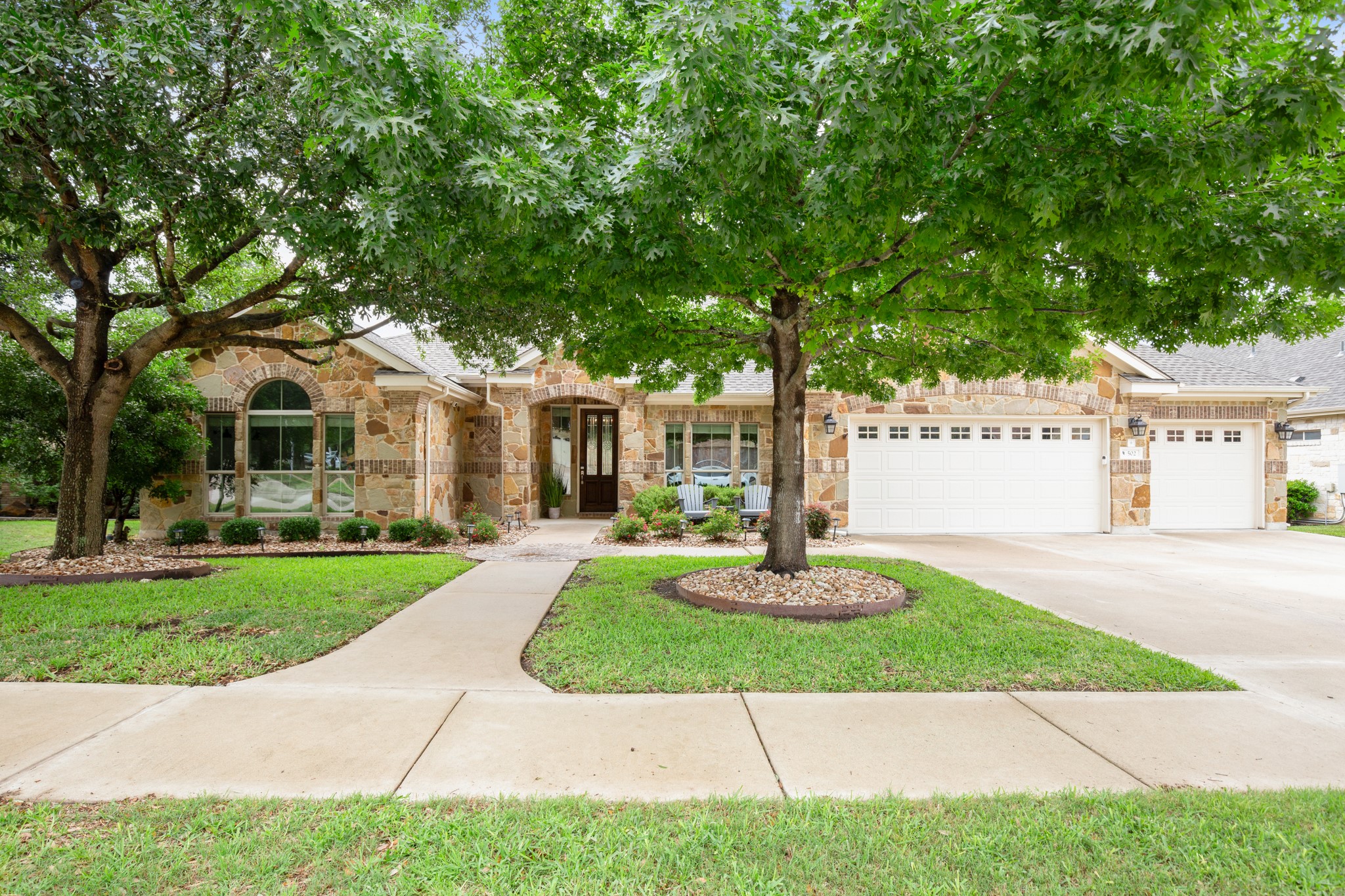 502 Spring Arbor Lane Cedar Park, TX 78613 - Photo 38 of 40 Tucked on a quiet half-moon cul-de-sac lined with sidewalks and mature trees, the home offers 3,276 square feet with 4 bedrooms, 3.5 baths, a home office, and more.