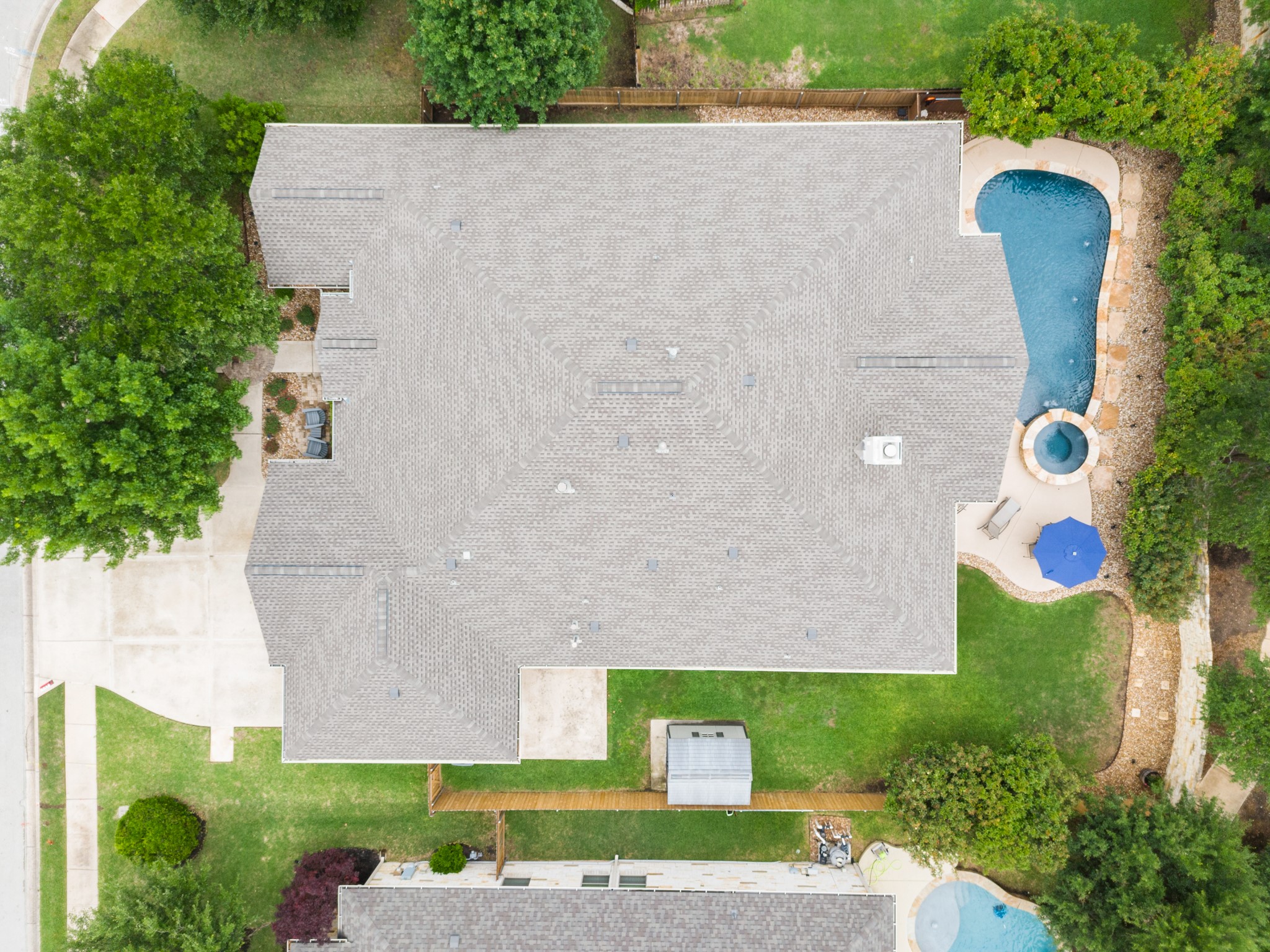 502 Spring Arbor Lane Cedar Park, TX 78613 - Photo 39 of 40 Extensive updates provide true peace of mind, including a recently replaced roof with durable 30-year shingles, updated HVAC systems (2024 & 2025), newer fencing, enhanced landscaping, and more.