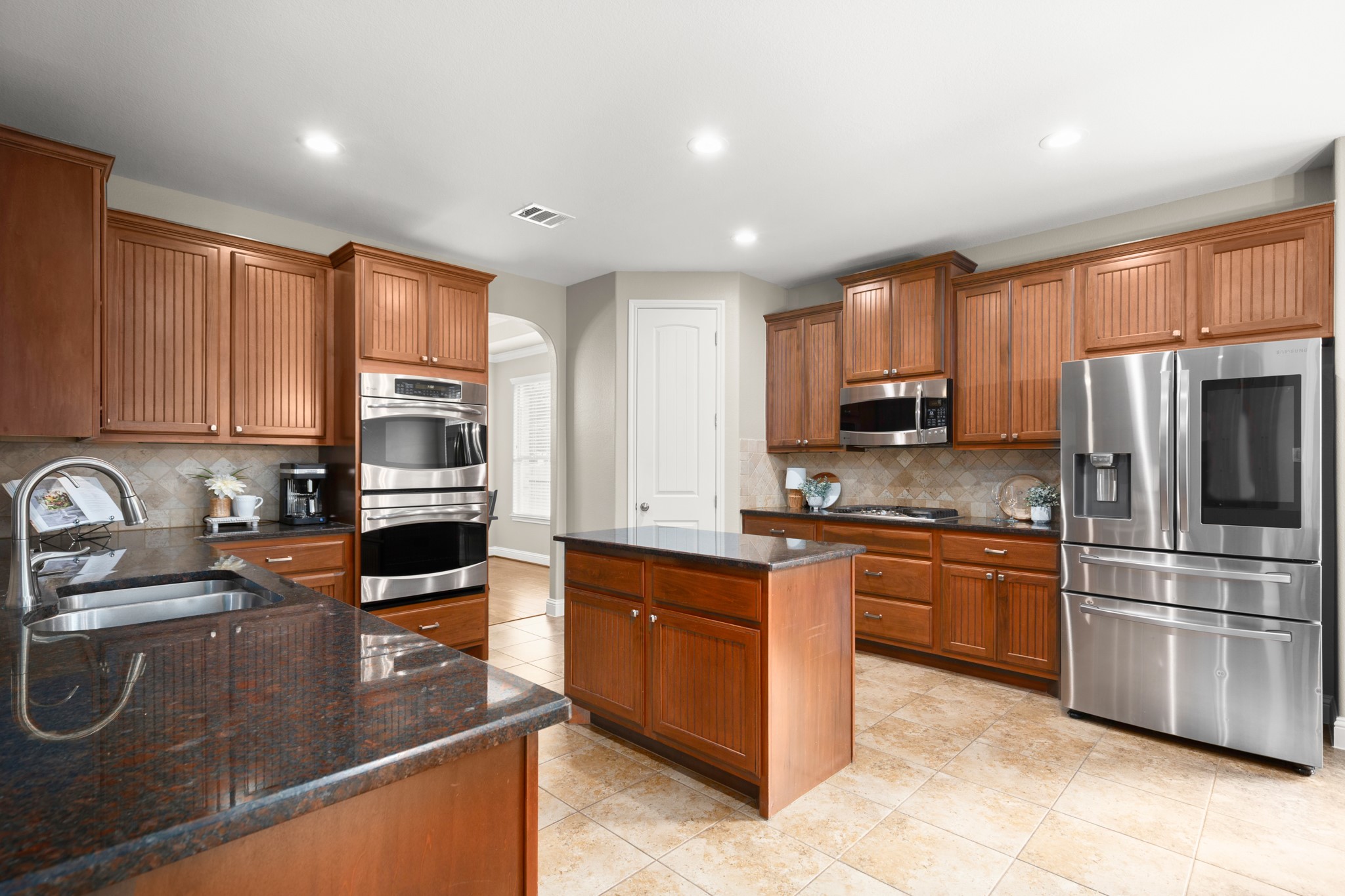 502 Spring Arbor Lane Cedar Park, TX 78613 - Photo 5 of 40 Amazing oversized kitchen comes ready to use with desirable modern finishes and timeless allure.