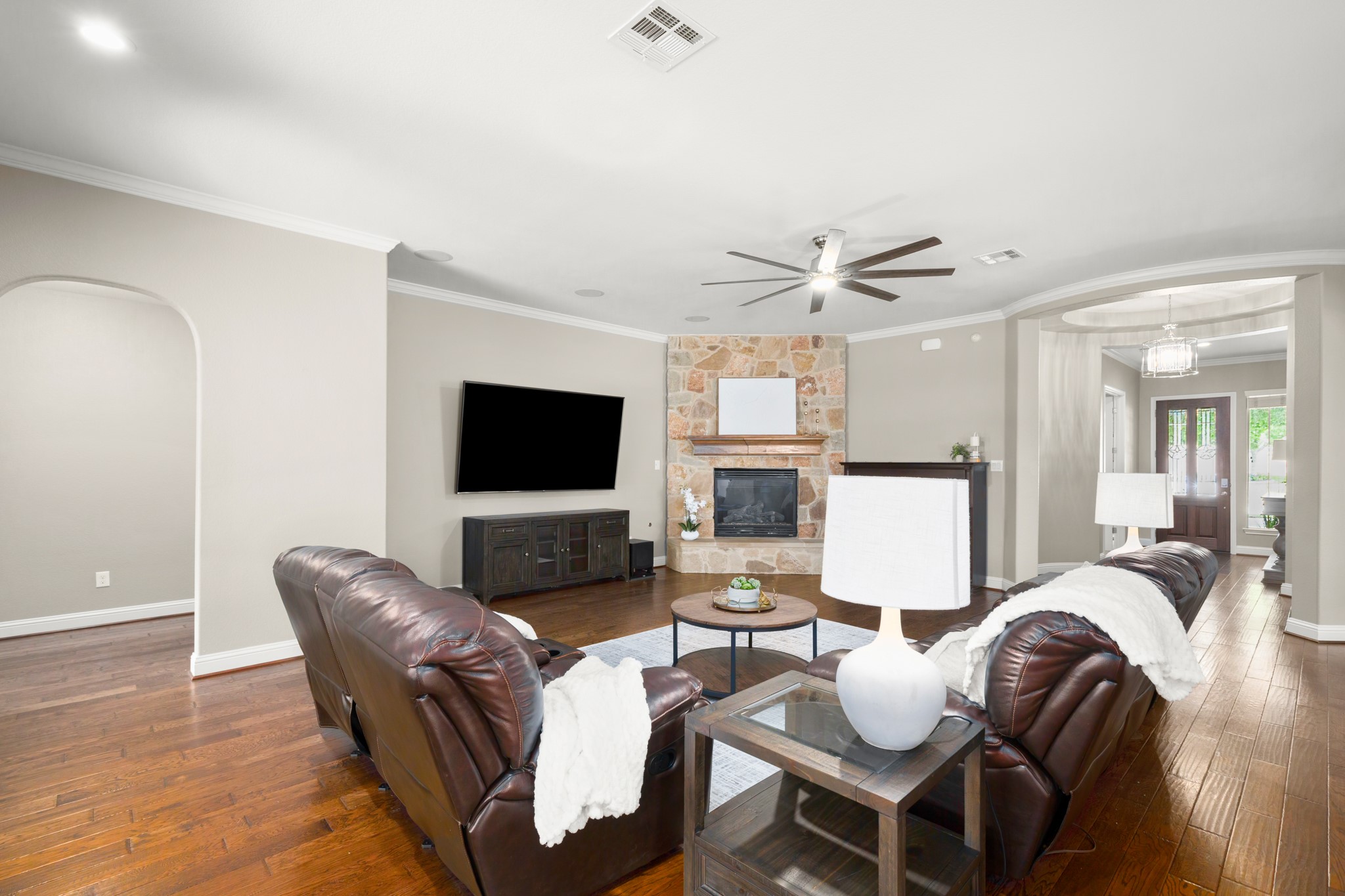 502 Spring Arbor Lane Cedar Park, TX 78613 - Photo 7 of 40 Inside a stunning entry foyer with central rotunda flows into the main living area.