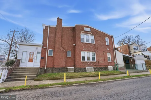 a brick building with a large windows
