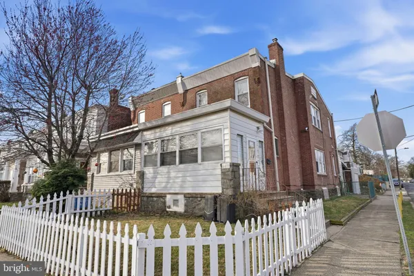 a view of a house with a garden