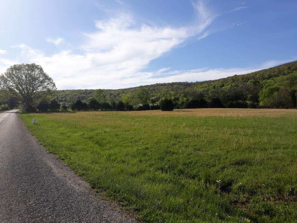 0 Hawkins Cove Road Cowan, TN 37318 - Photo 7 of 8 a view of a field with an ocean