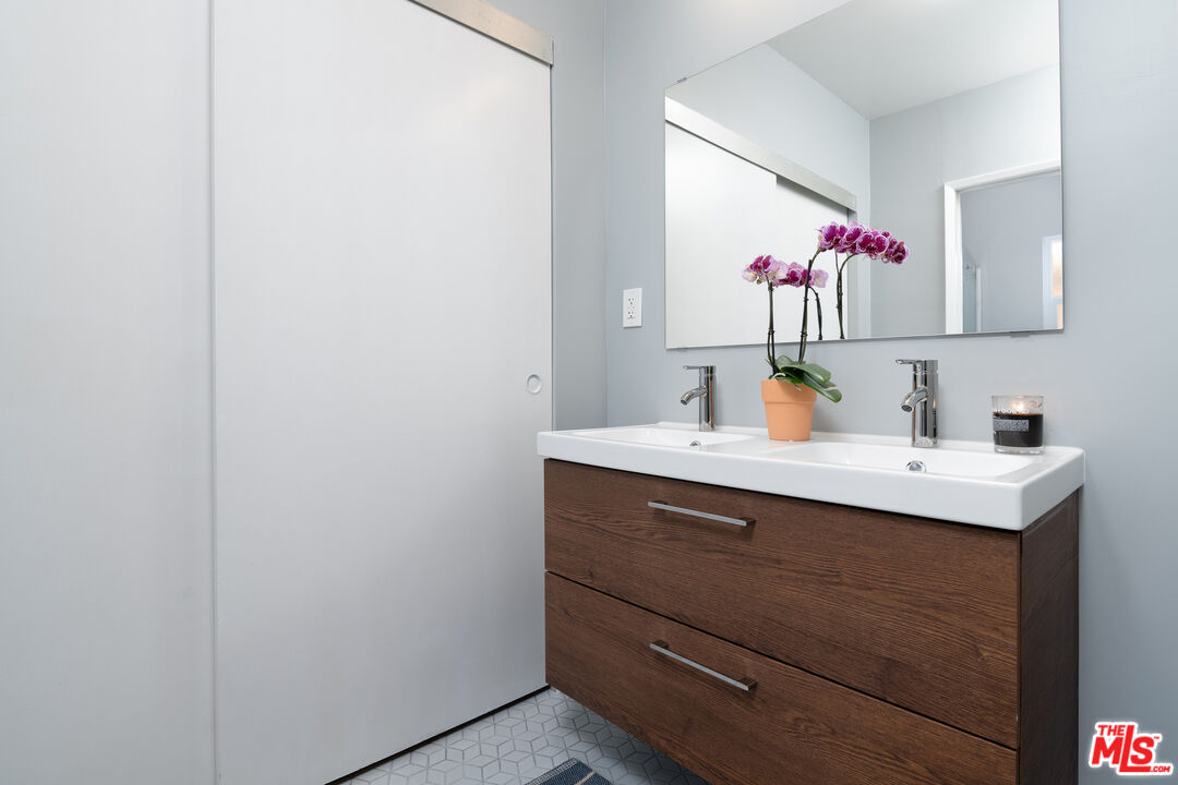 3061 Highview Avenue Altadena, CA 91001 - Photo 19 of 30 a bathroom with a sink and a mirror