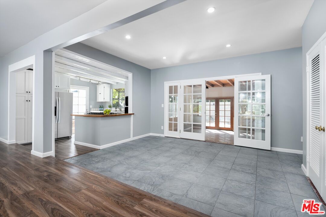 3061 Highview Avenue Altadena, CA 91001 - Photo 21 of 30 a view of an empty room with a window and wooden floor