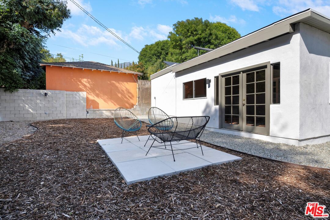 3061 Highview Avenue Altadena, CA 91001 - Photo 23 of 30 a view of a house with backyard and sitting area