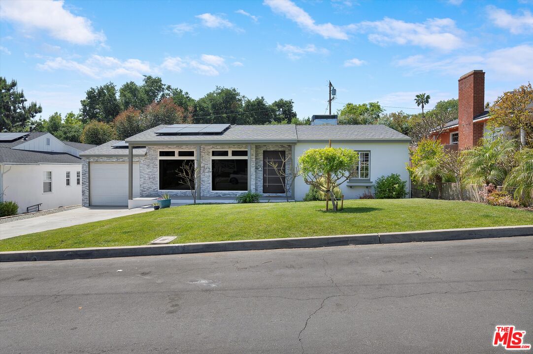 3061 Highview Avenue Altadena, CA 91001 - Photo 27 of 30 a front view of a house with a yard and garage
