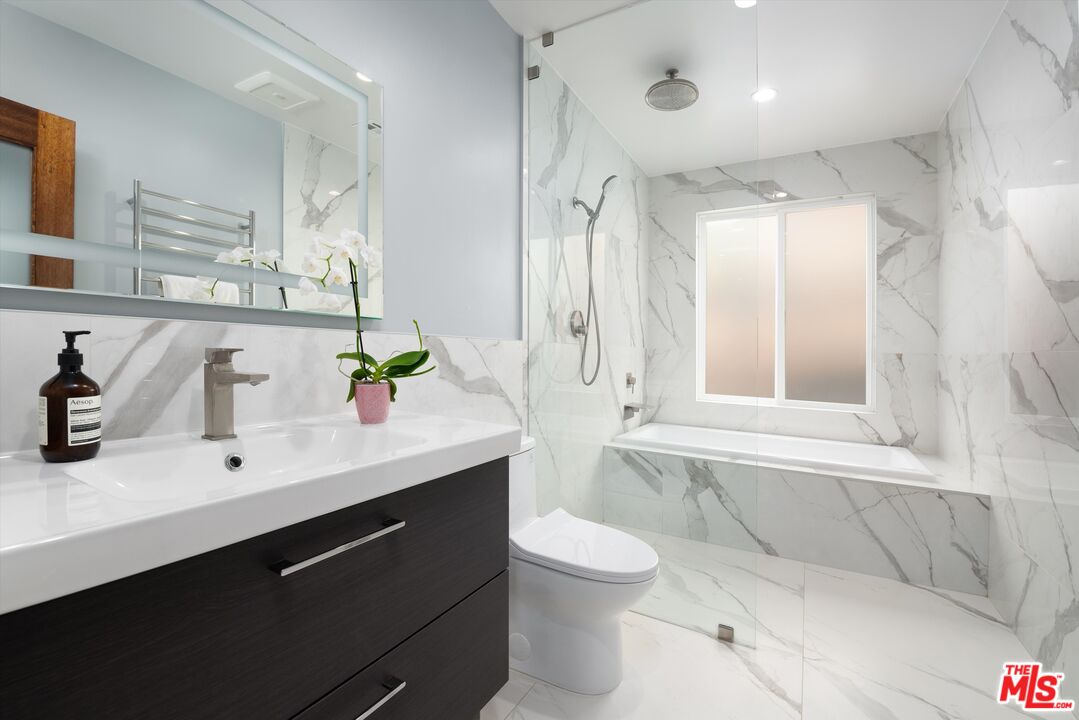 3061 Highview Avenue Altadena, CA 91001 - Photo 9 of 30 a bathroom with a double vanity sink mirror and toilet