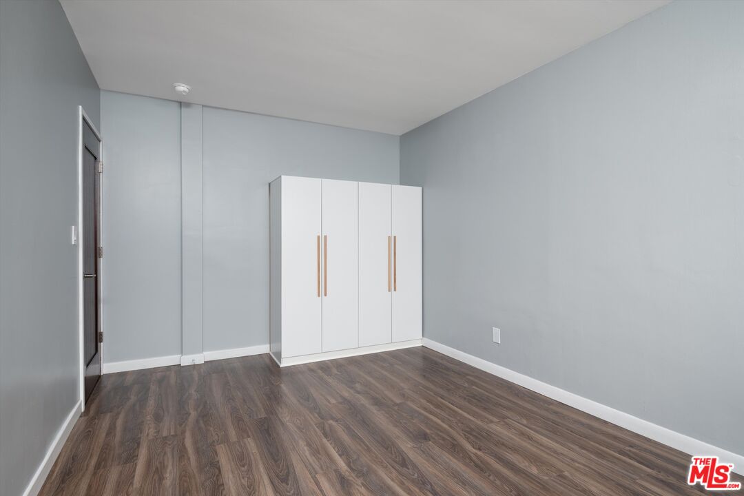 3061 Highview Avenue Altadena, CA 91001 - Photo 10 of 30 a view of an empty room with wooden floor and closet