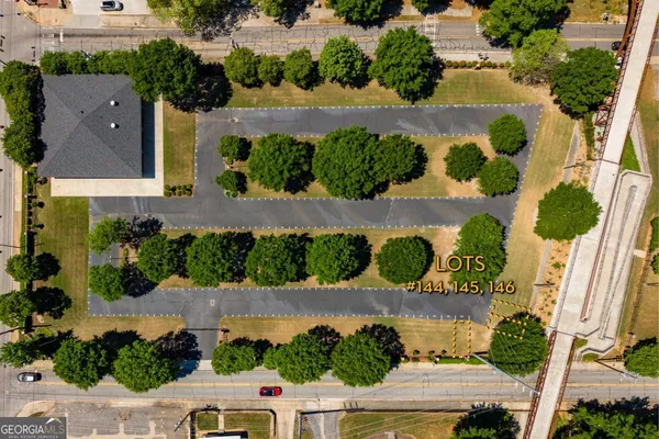 an aerial view of a house with a garden