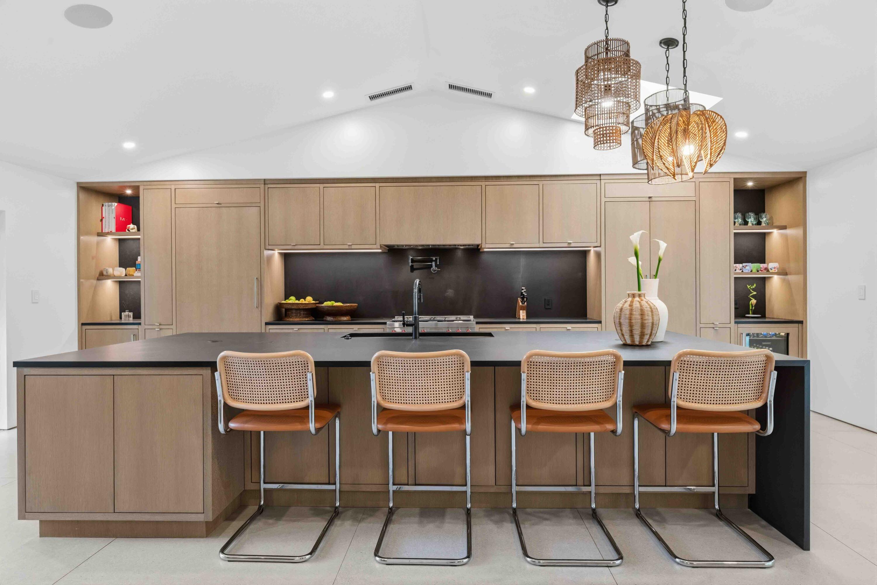 18660 Long Lake Drive Boca Raton, FL 33496 - Photo 18 of 75 a kitchen with a dining table and chairs
