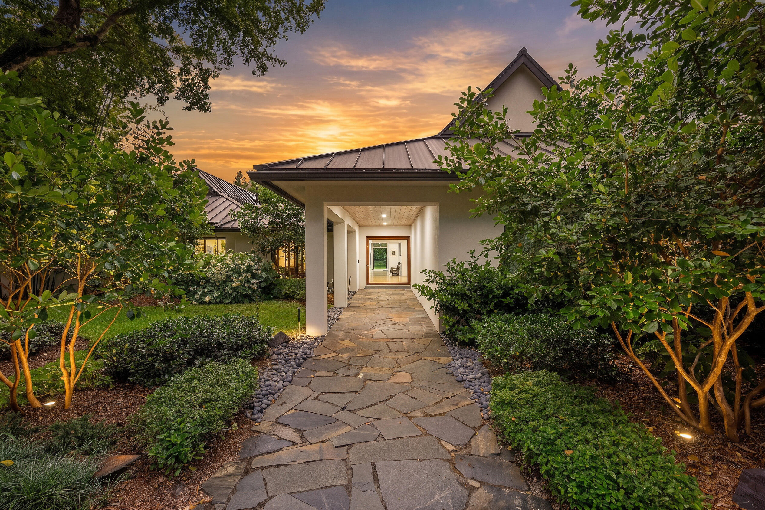18660 Long Lake Drive Boca Raton, FL 33496 - Photo 2 of 75 a front view of a house with garden