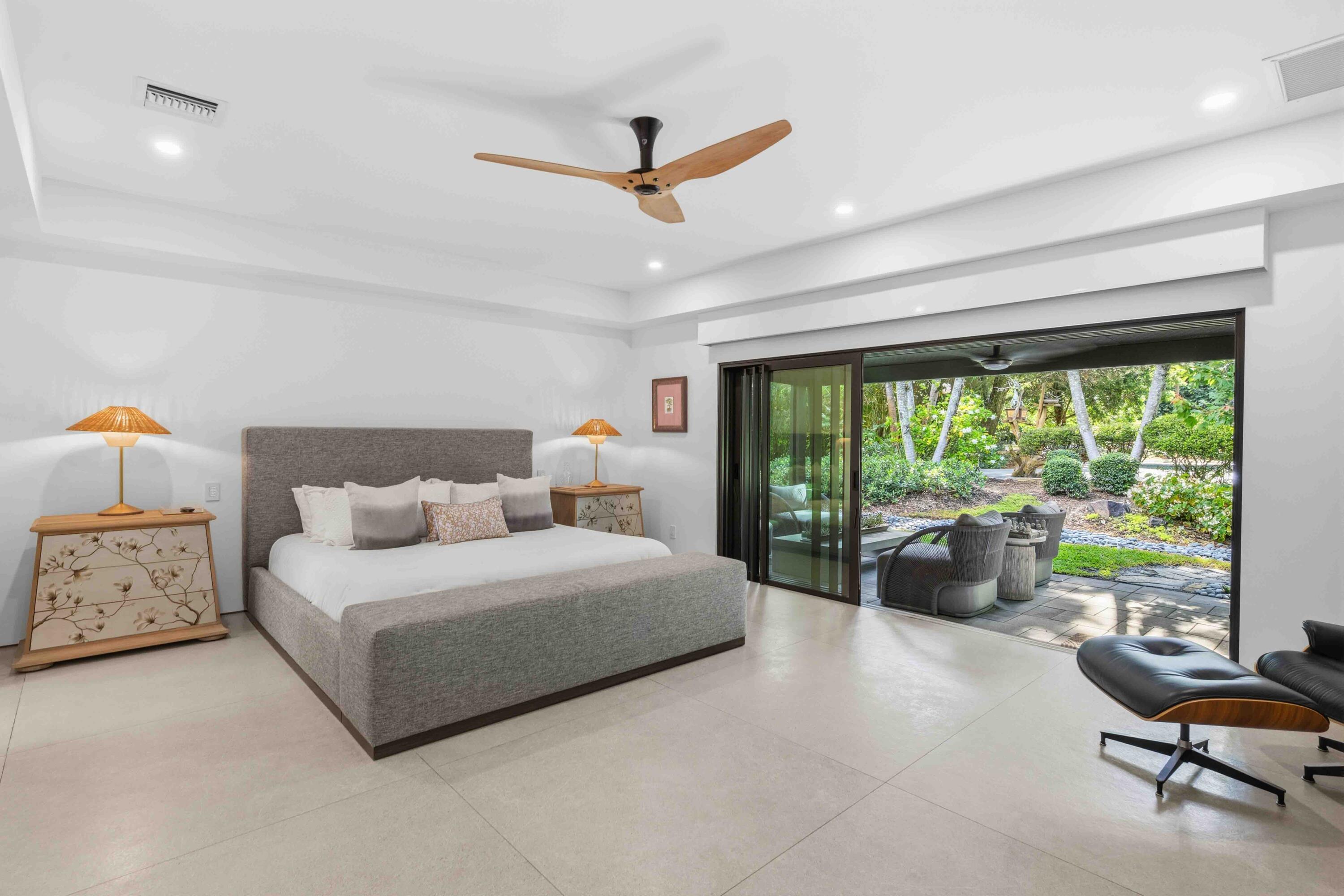 18660 Long Lake Drive Boca Raton, FL 33496 - Photo 31 of 75 a bedroom with a bed and a large window