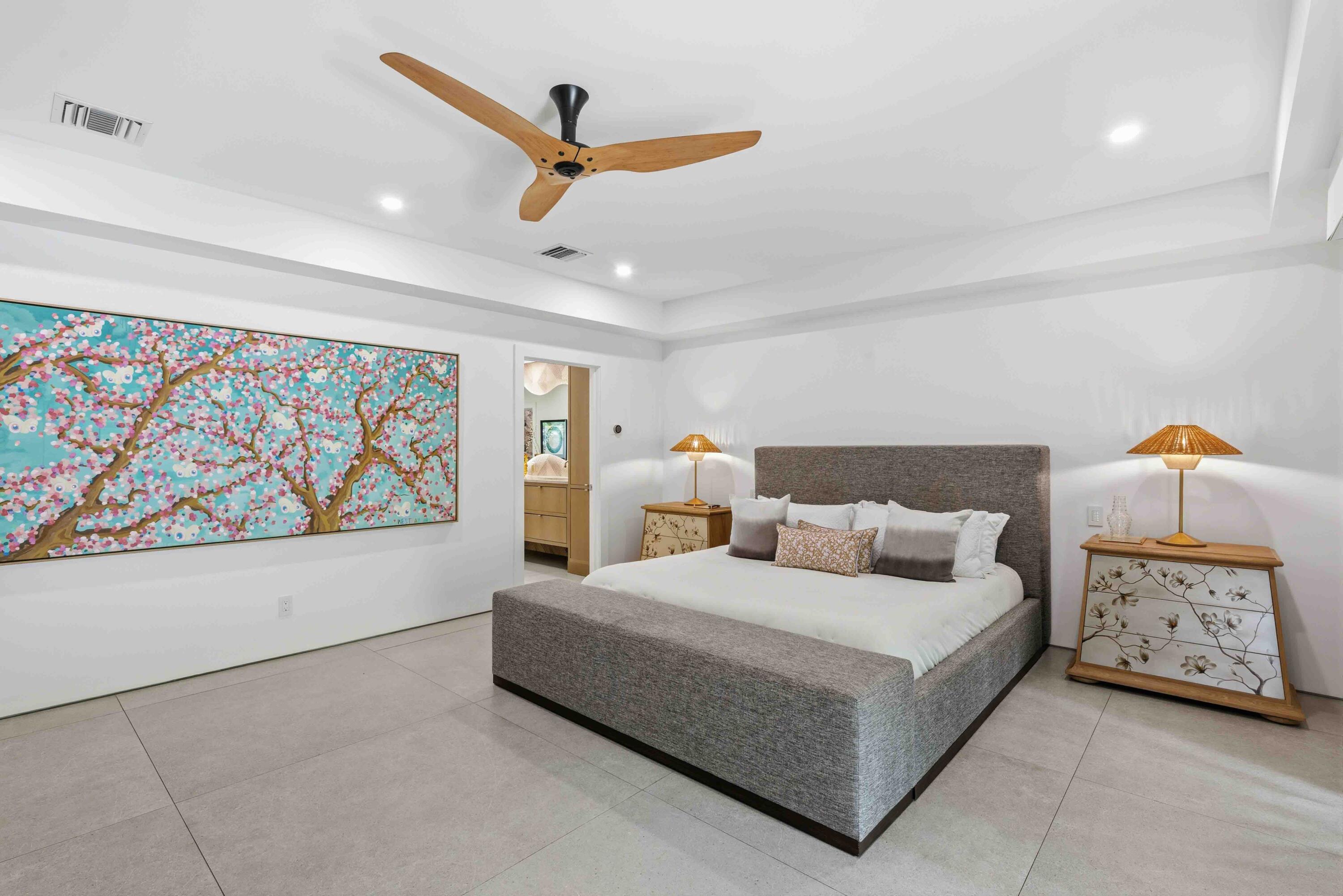 18660 Long Lake Drive Boca Raton, FL 33496 - Photo 34 of 75 a bedroom with a bed and a painting on the wall