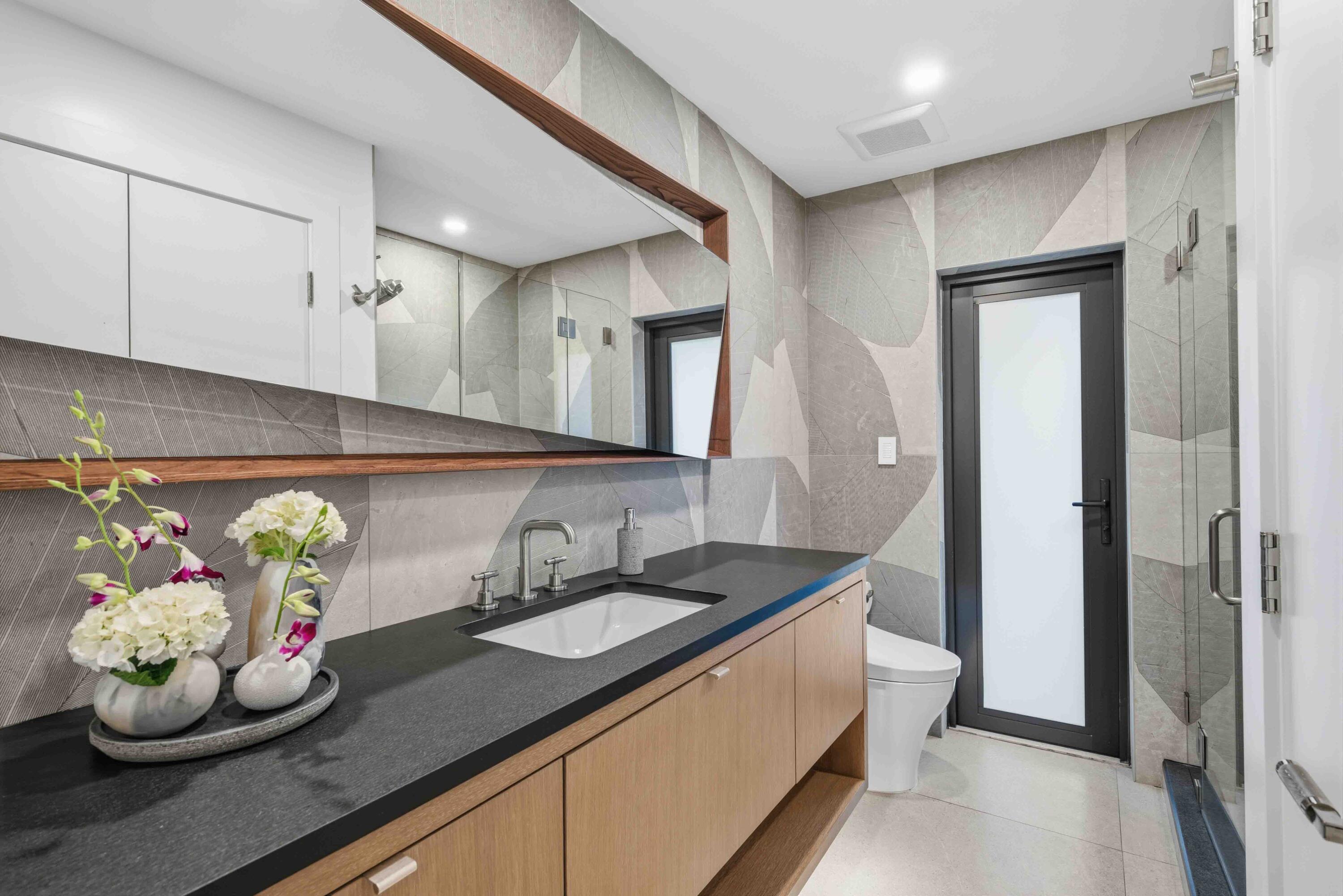 18660 Long Lake Drive Boca Raton, FL 33496 - Photo 47 of 75 a bathroom with a sink and a mirror